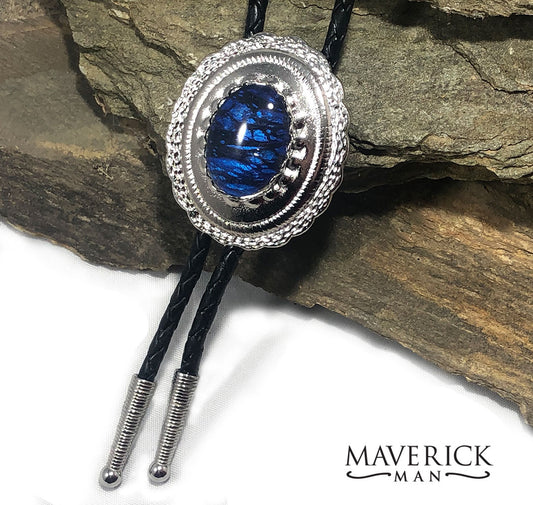 Handsome concho bolo with metallic blue and black stone