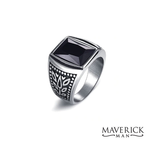 Handsome titanium ring with faceted black onyx