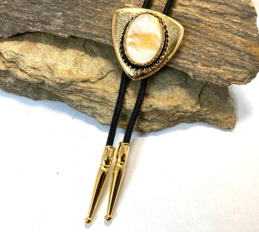 Eye-catching gold and white bolo and buckle set