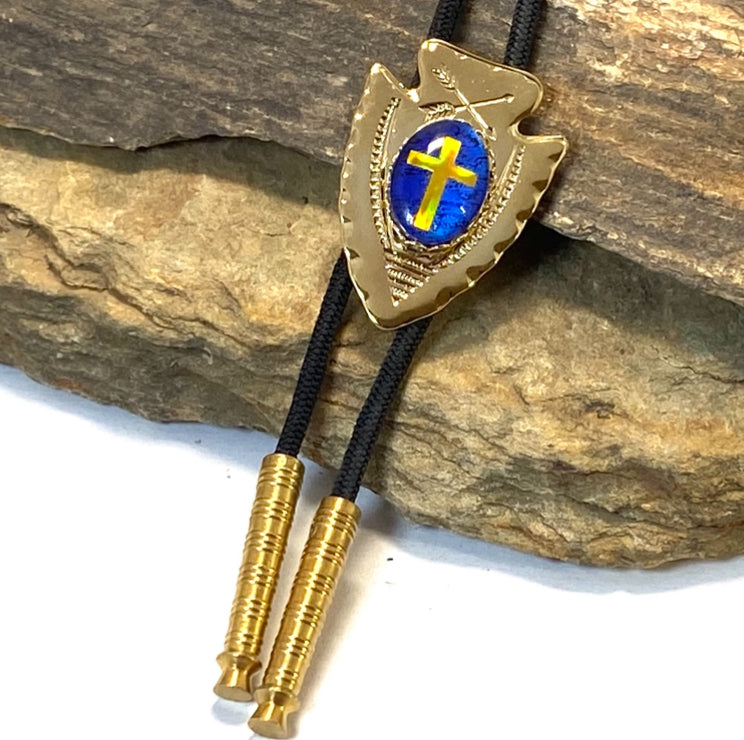 Lightweight golden arrowhead bolo with gold holographic cross