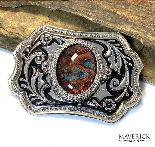 Large silver and black ornate buckle with turquoise and copper hand painted stone