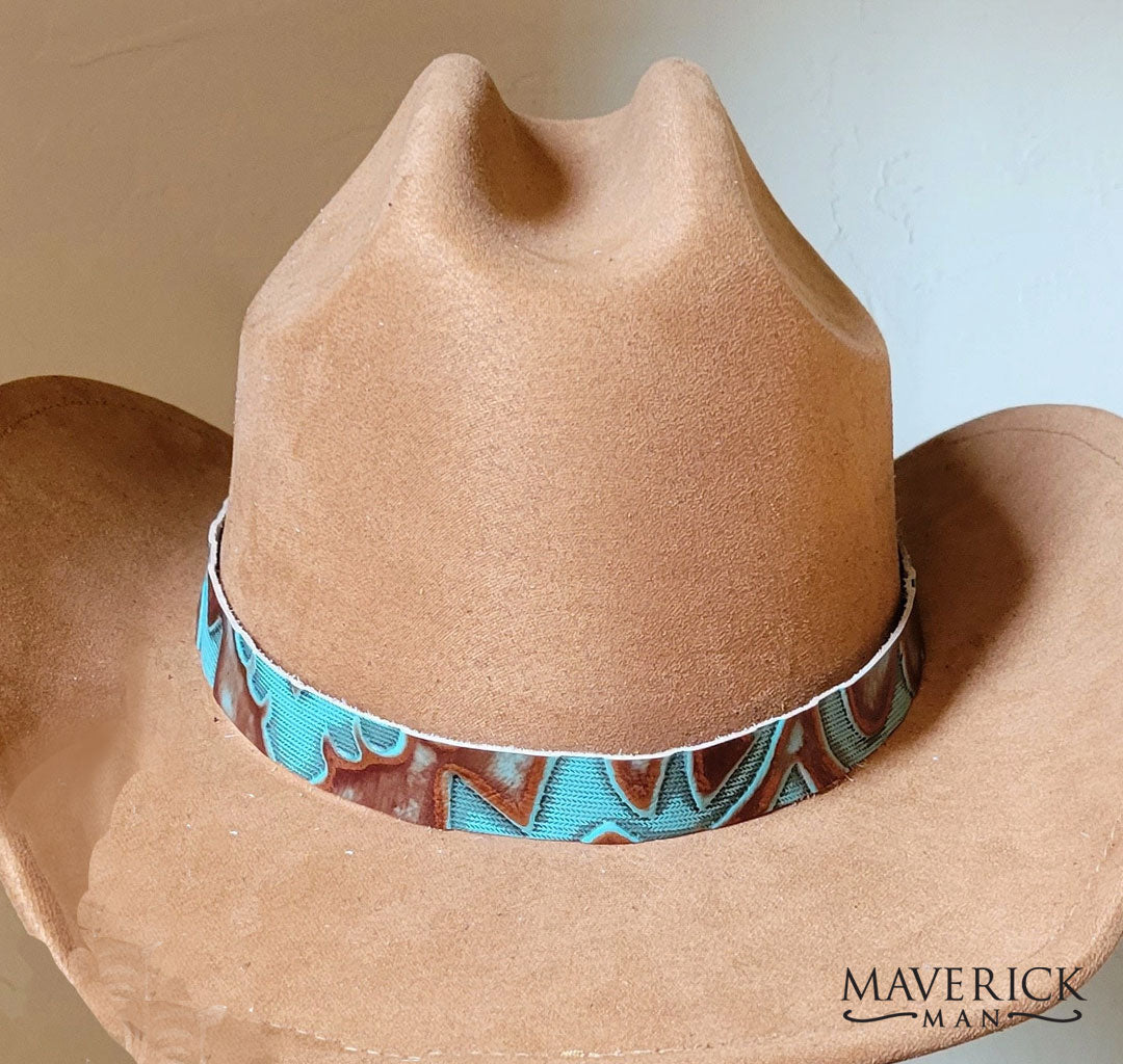 Turquoise and rust accents on leather hat band