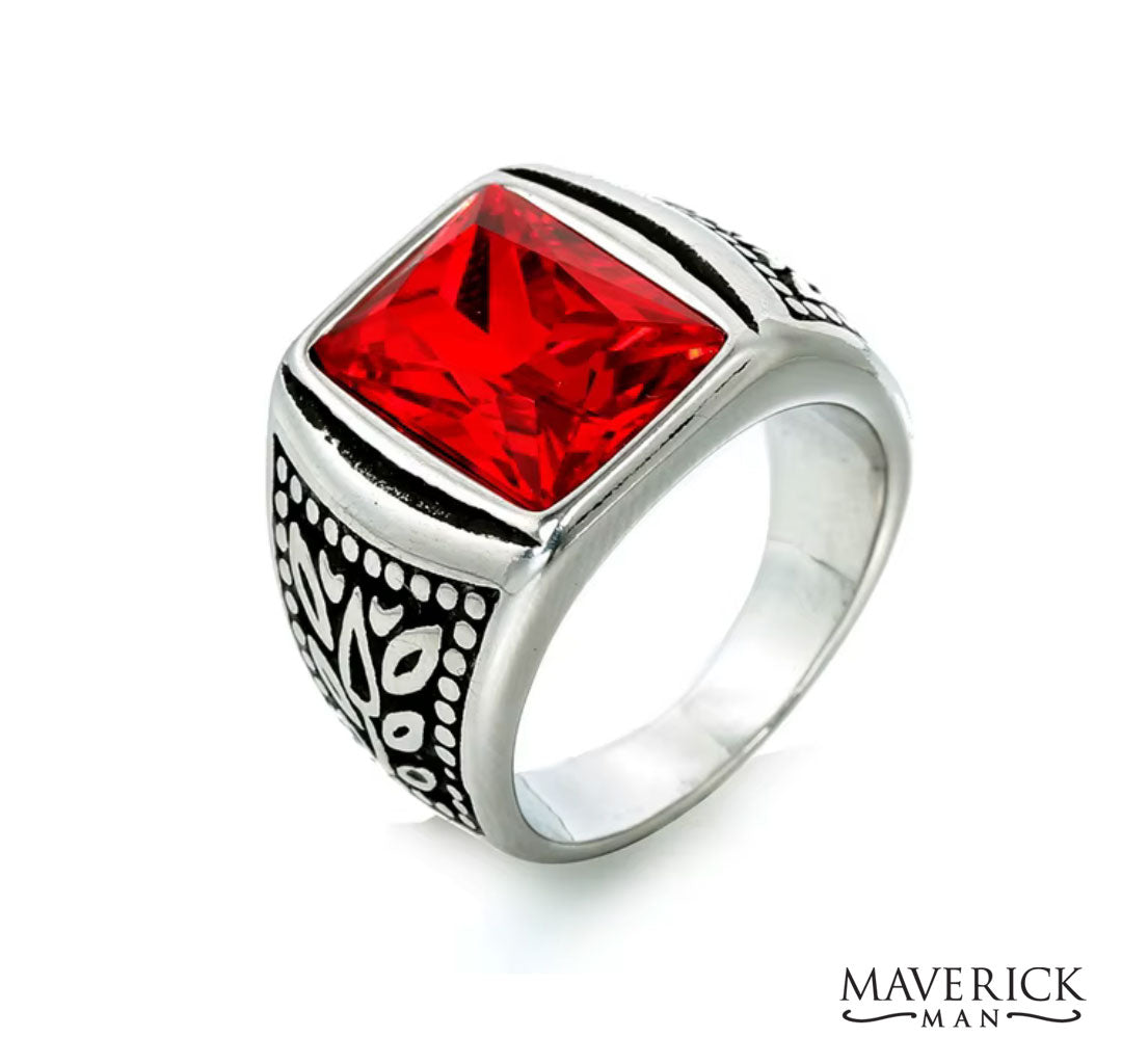 Stainless steel ring with faceted red stone