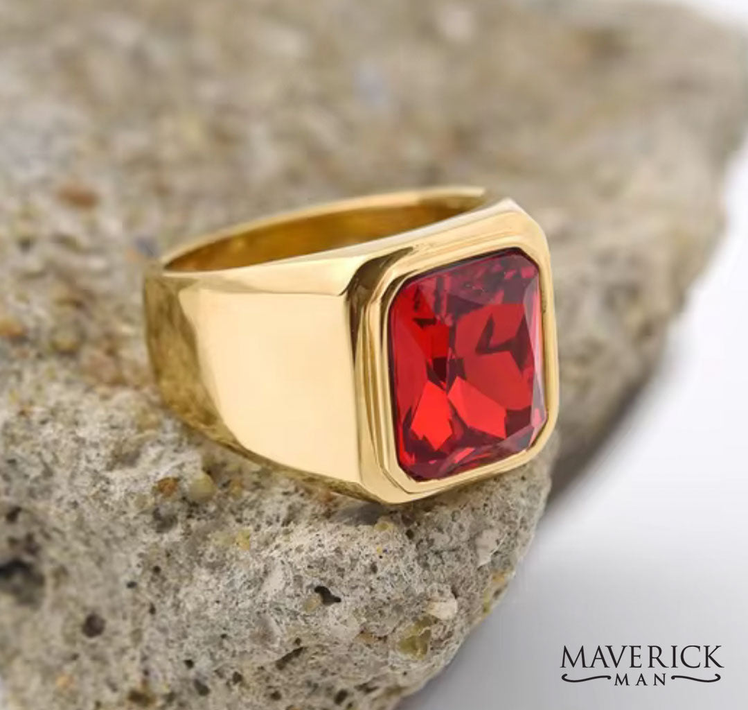 Gold-plated stainless steel ring with faceted red stone