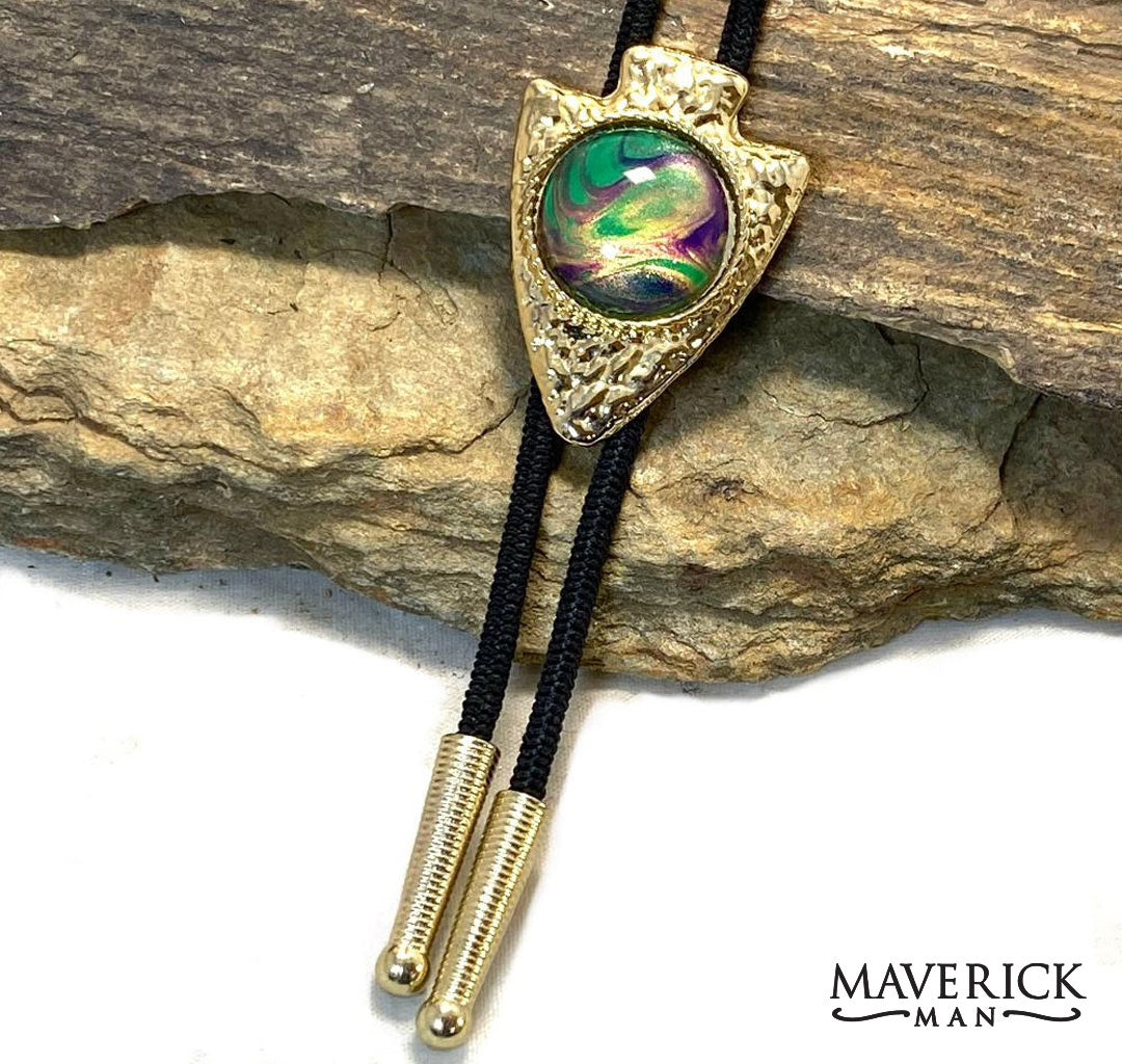 Golden arrowhead from our Party Gras collection of green gold and purple