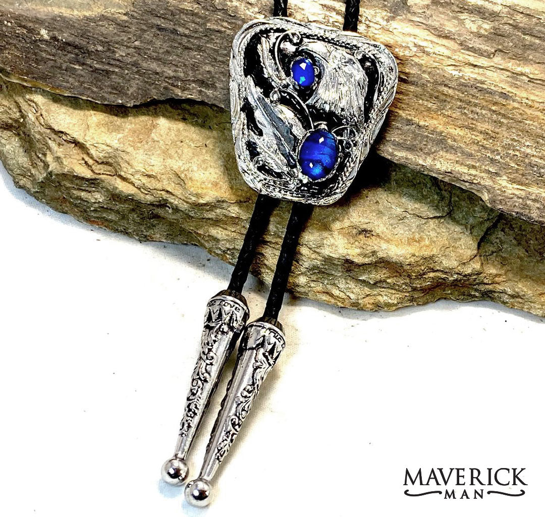 Silver eagle bolo with hand painted stones in sapphire blue and black
