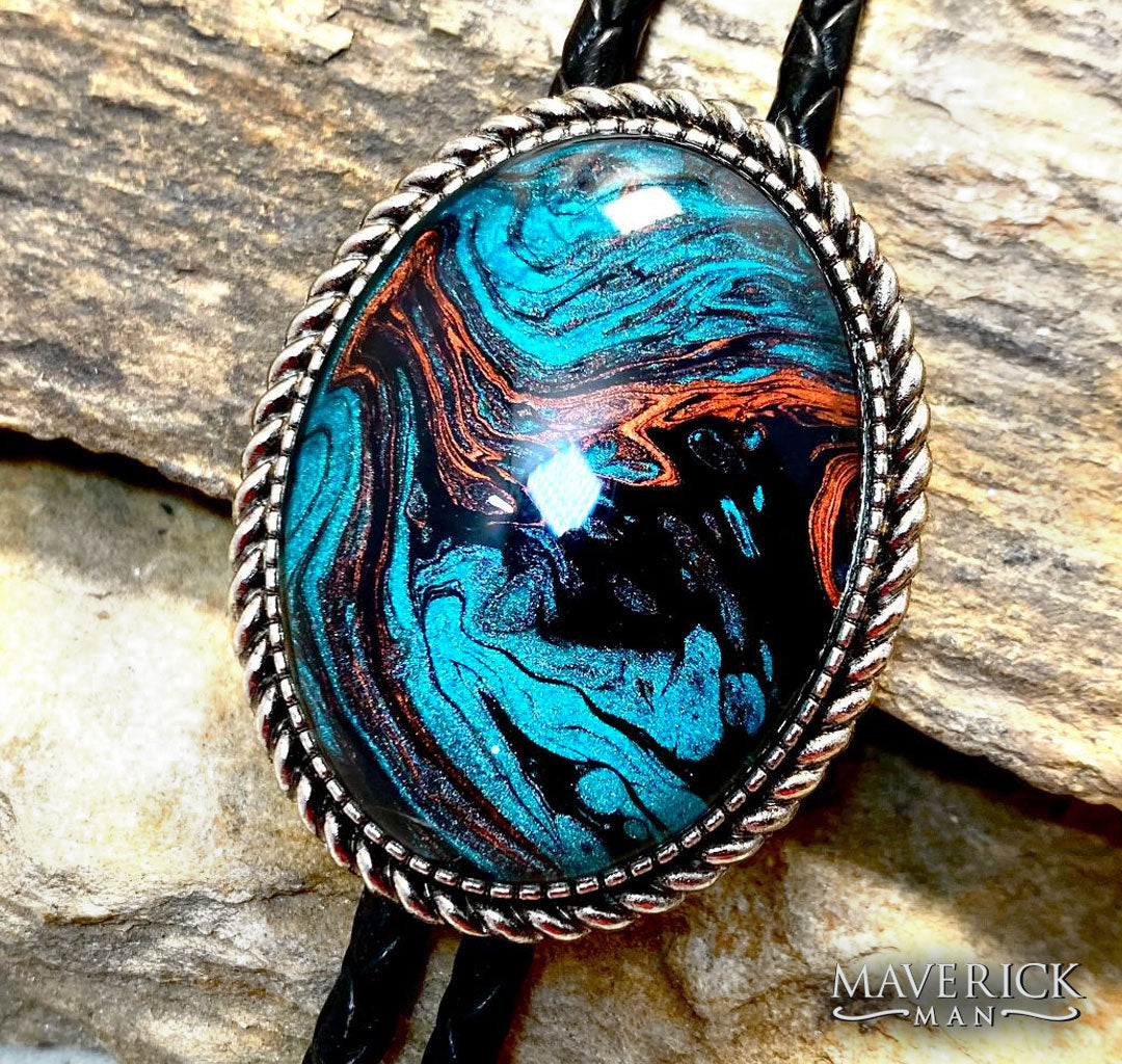 Large silver braided bolo with hand painted turquoise and copper stone