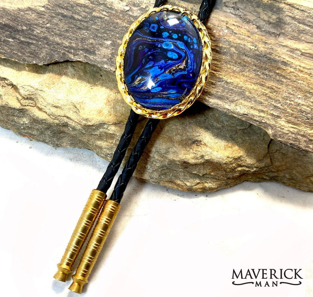 Large golden twist bolo with stunning sapphire blue hand painted stone
