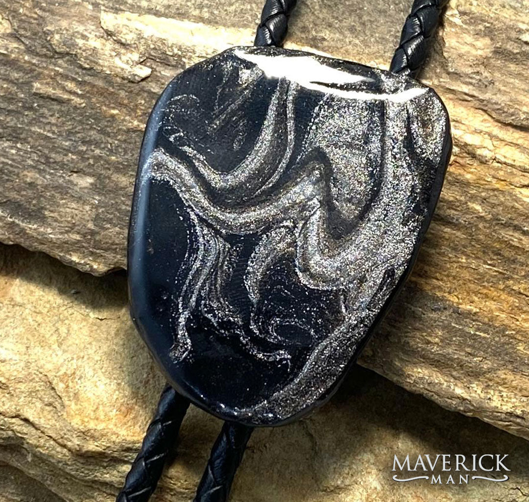 Swirls of black and platinum on our hand painted slate bolo