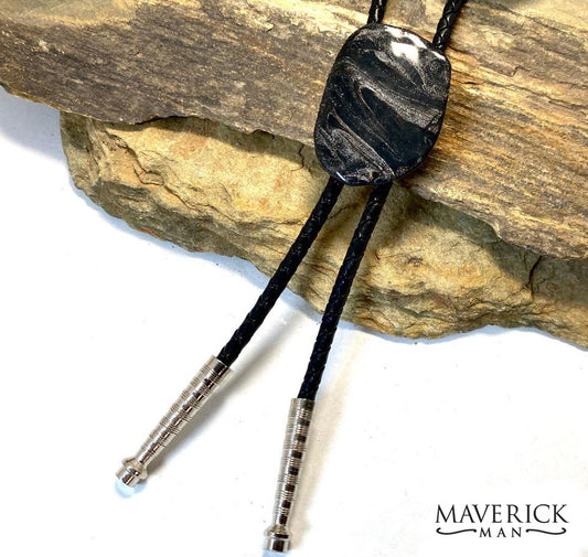 Eye-catching hand painted slate bolo with our top-selling black and platinum palette