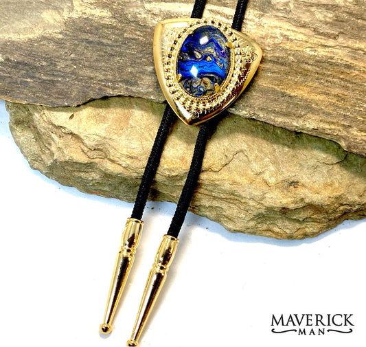 Golden triangular bolo with handsome blue and gold stone