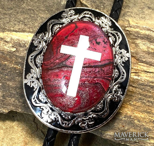 Cross bolo in dressy silver and black setting with hand painted stone