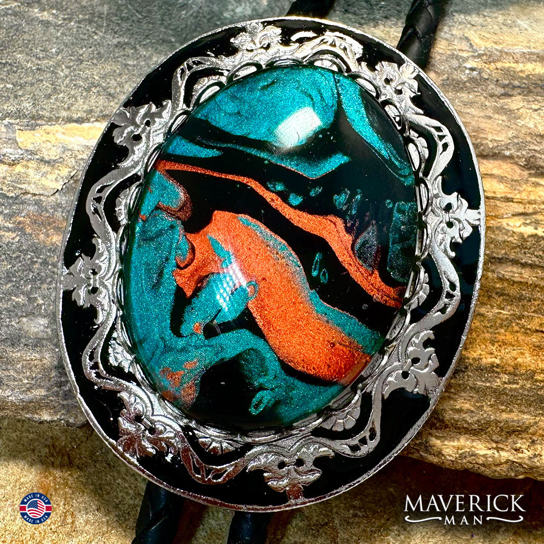 Silver and black filigree bolo tie and buckle set with hand painted stones