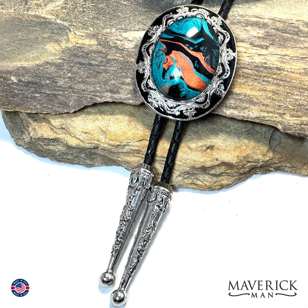 Silver and black filigree bolo tie and buckle set with hand painted stones