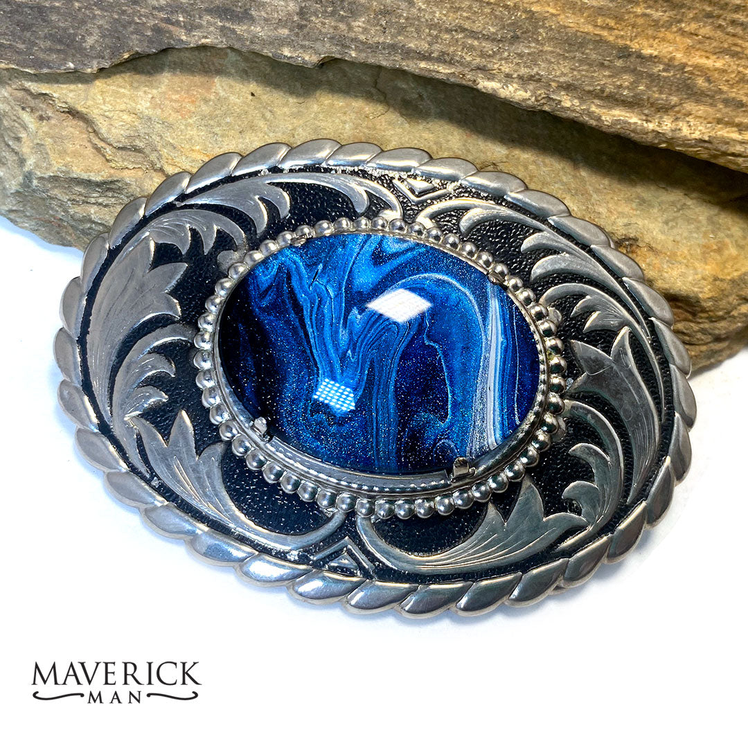Striking belt buckle and bolo tie set with our BLUES hand painted stones