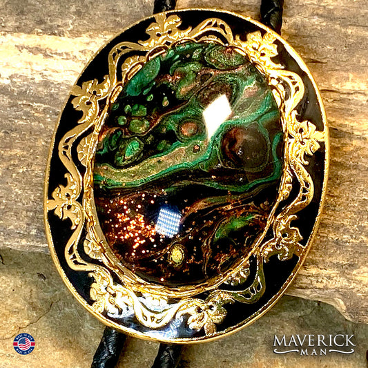 Golden filigree bolo tie with hand painted stone
