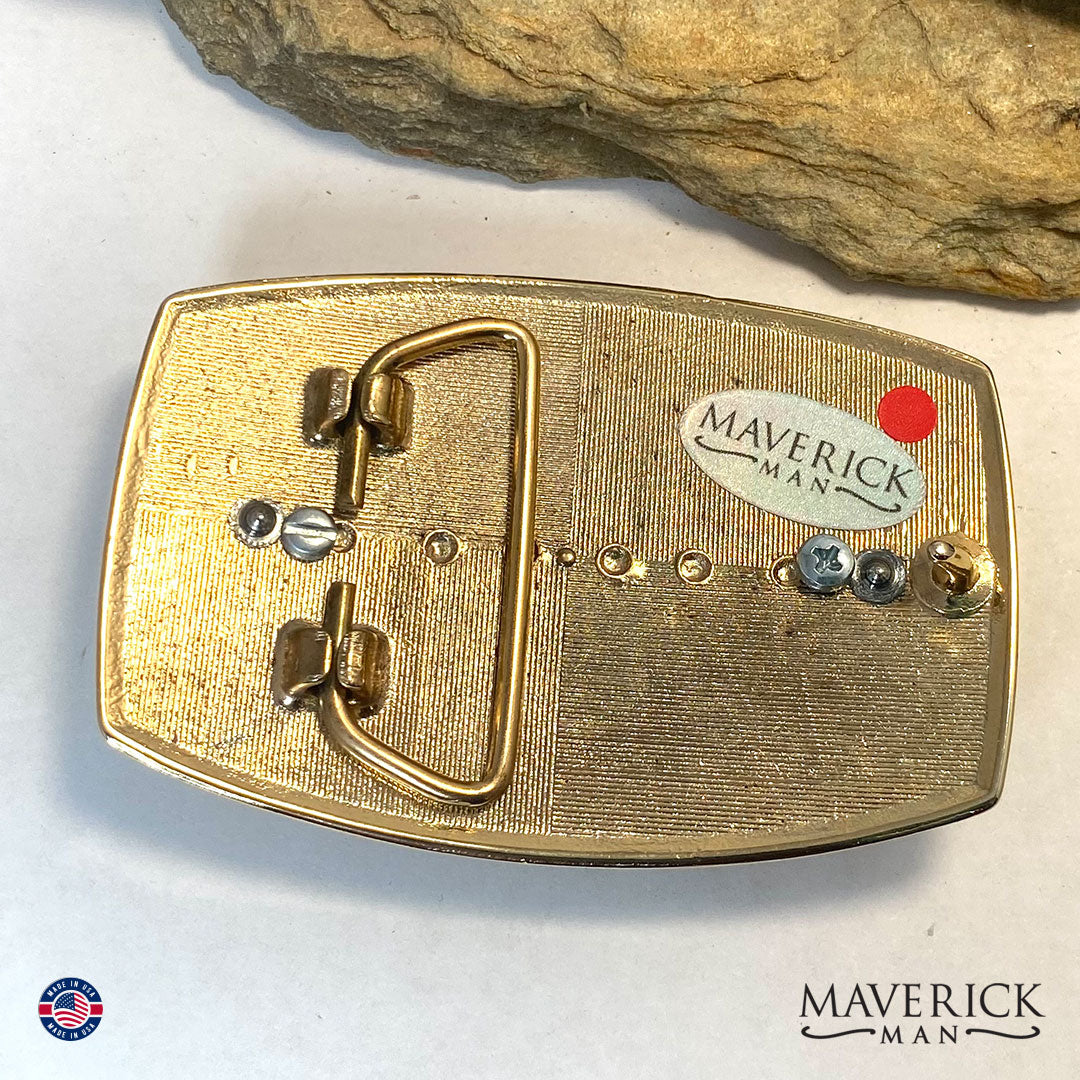 Striking black and blue bolo tie and buckle set in gold