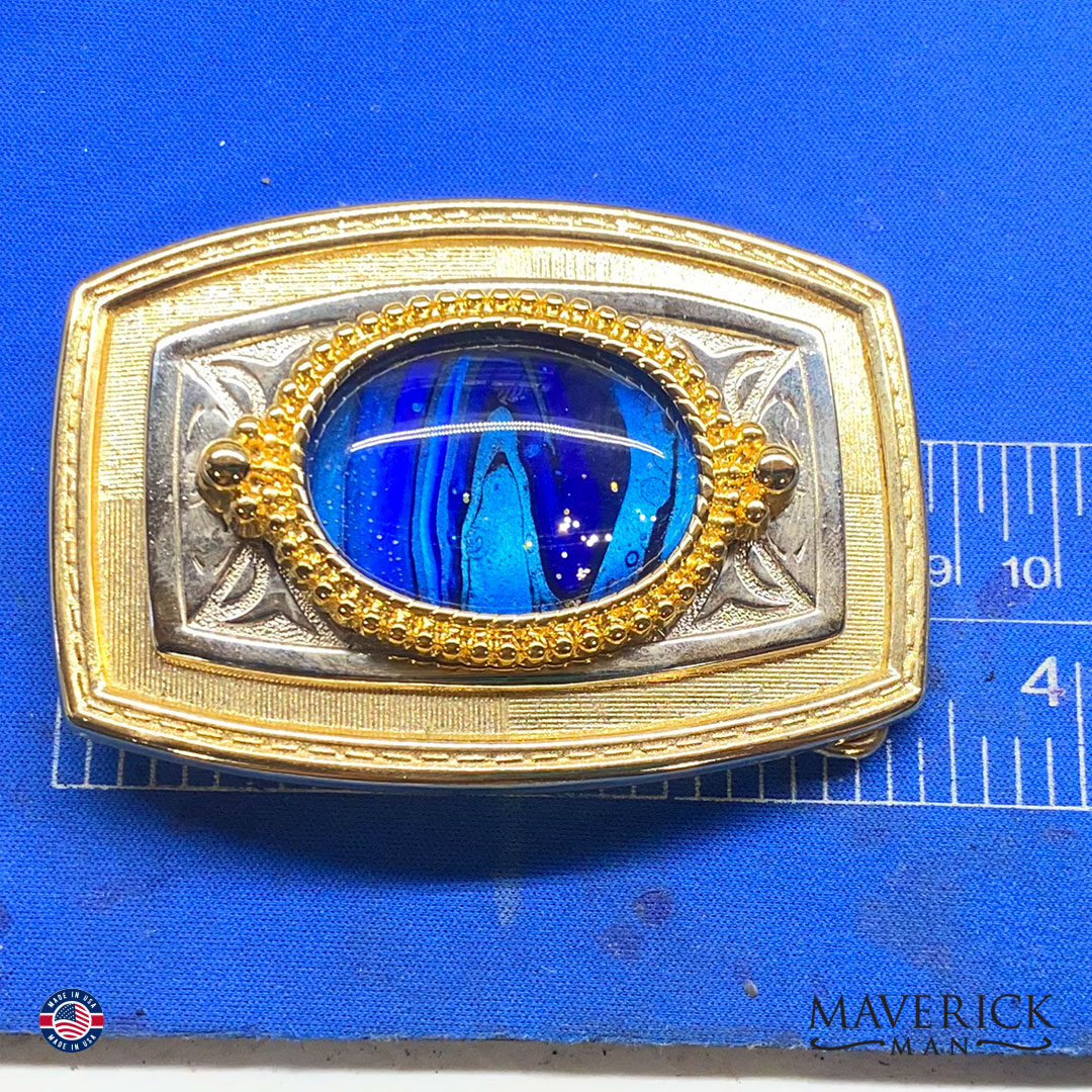 Striking black and blue bolo tie and buckle set in gold