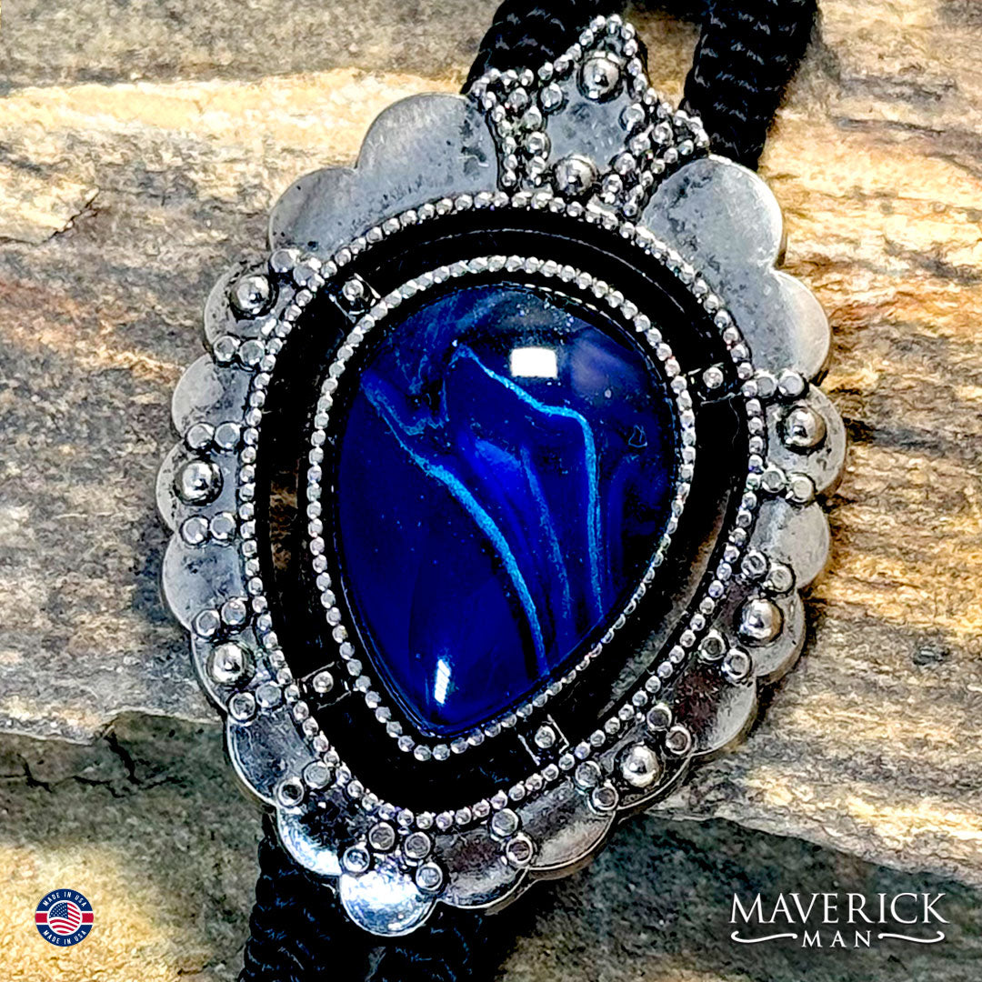 Silver and blue bolo tie with long cords