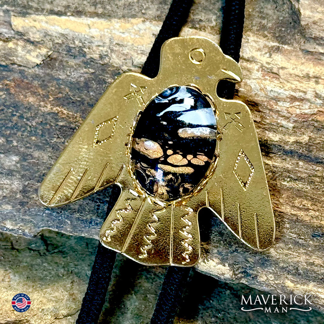 Golden thunderbird bolo tie with hand painted stone
