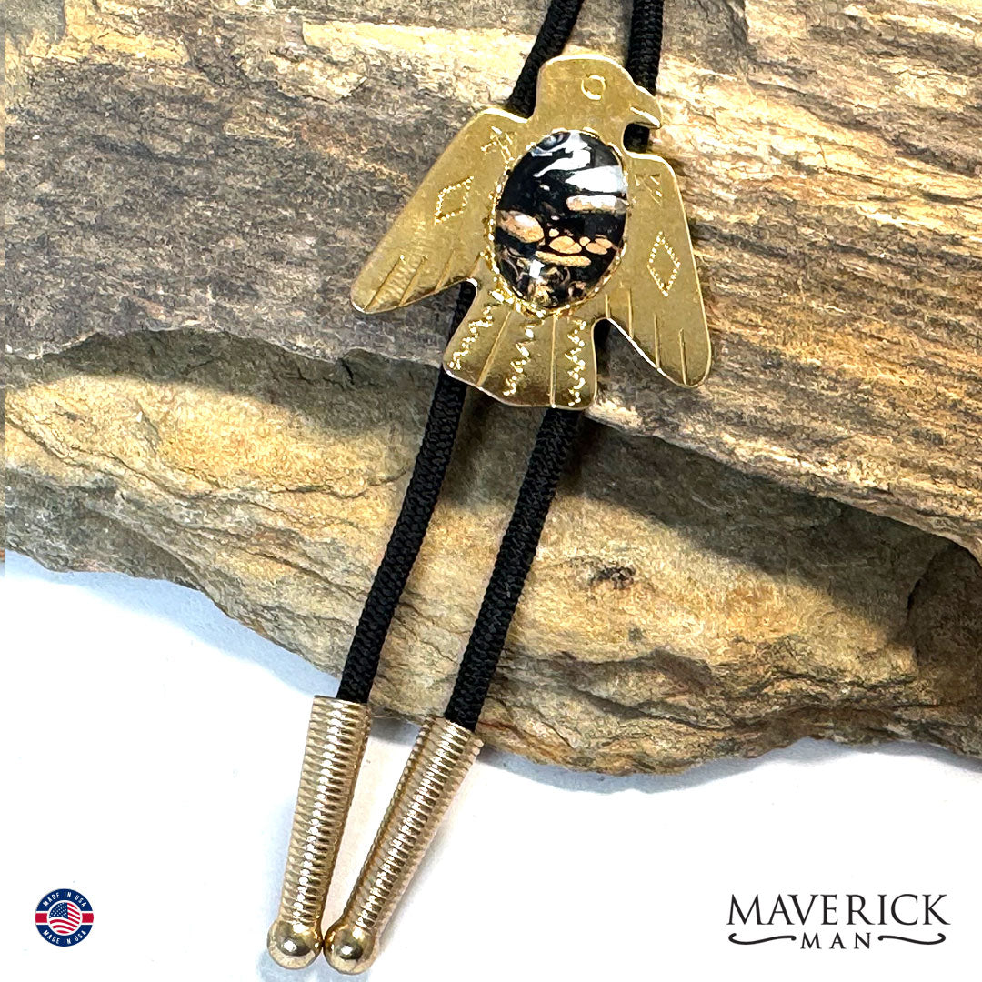 Golden thunderbird bolo tie with hand painted stone