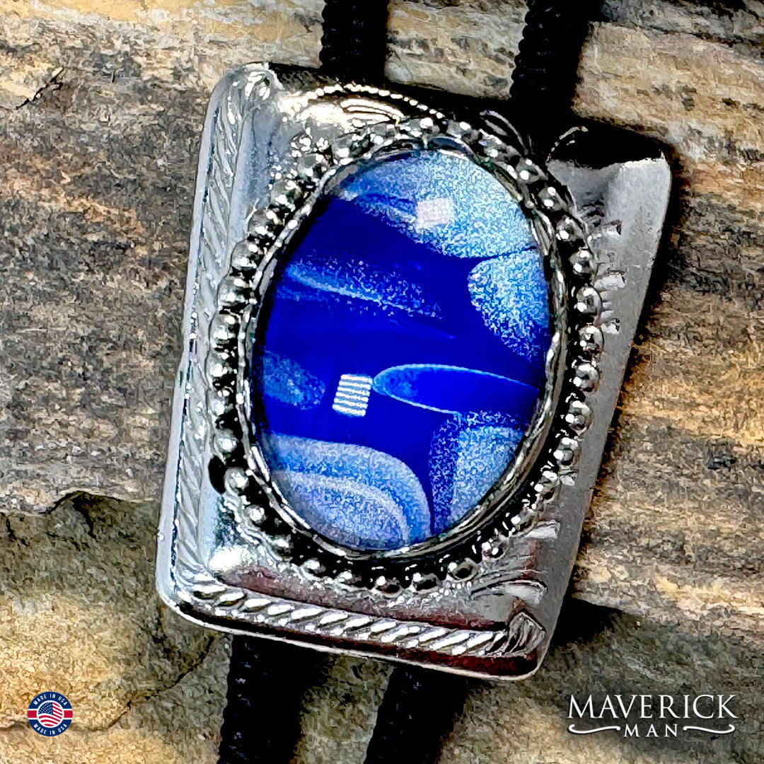 Silver bolo tie with hand painted blue and silver stone