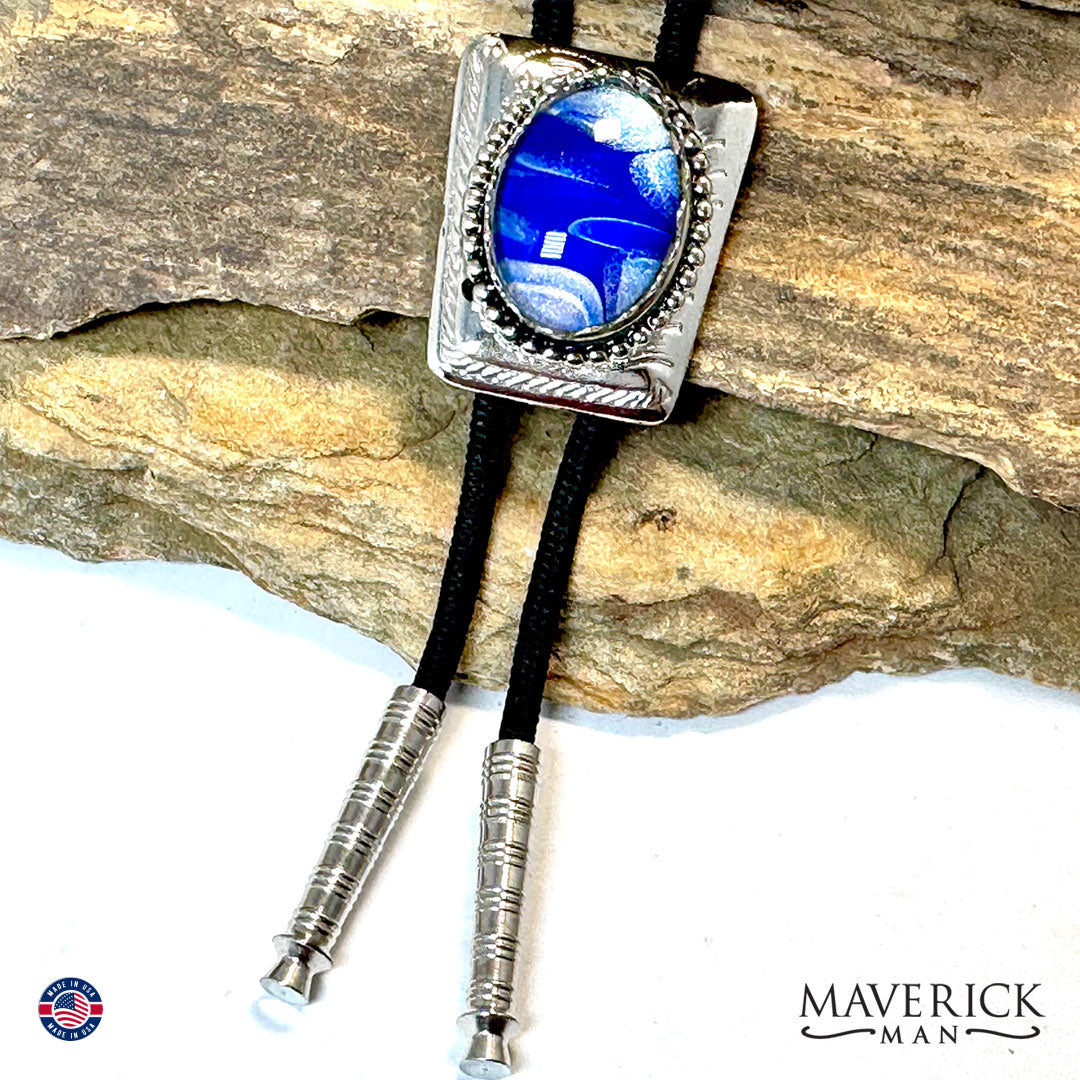 Silver bolo tie with hand painted blue and silver stone