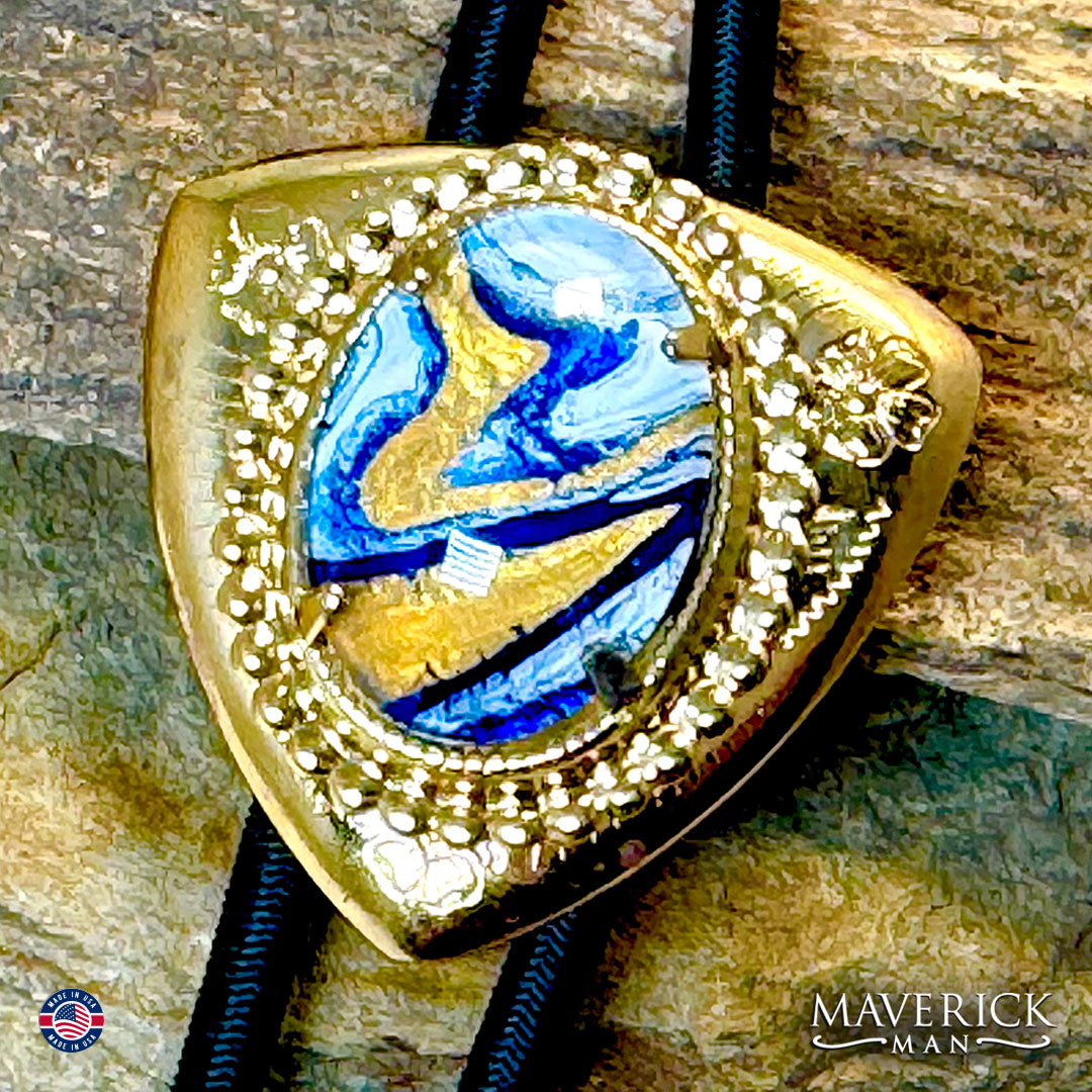 Golden triangular bolo with hand painted stone