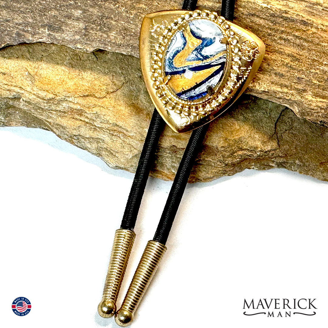 Golden triangular bolo with hand painted stone