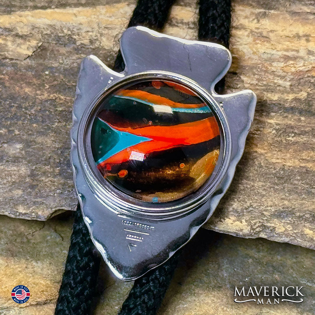 Silver arrowhead bolo tie with southwestern stone