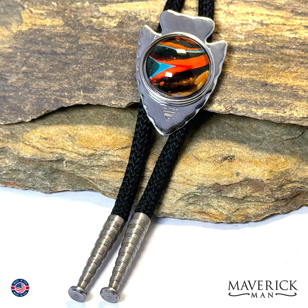Silver arrowhead bolo tie with southwestern stone