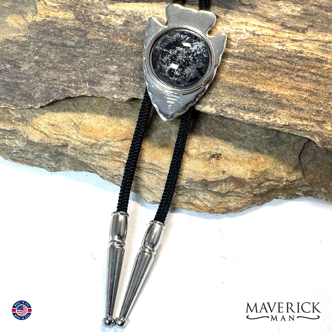 Silver arrowhead bolo tie with hand painted stone