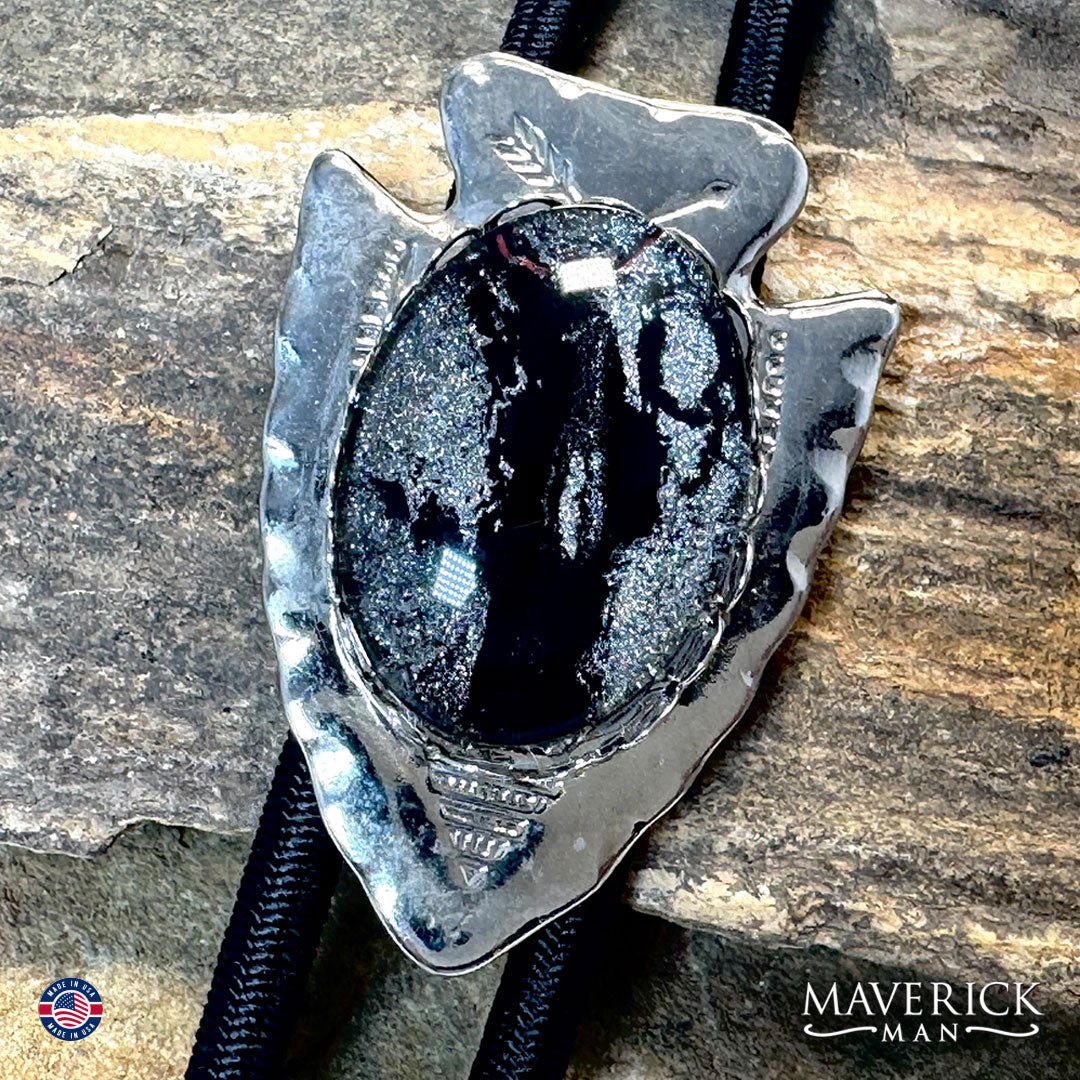 Silver arrowhead bolo tie with hand painted stone