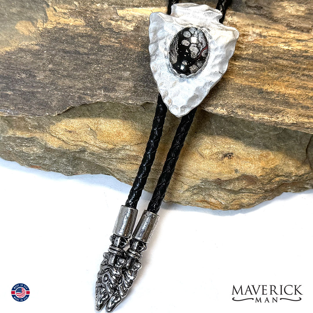 Hammered arrowhead bolo with hand painted stone