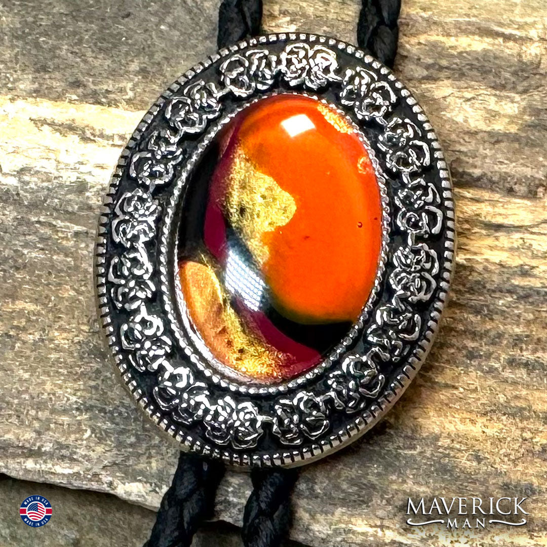 Silver filigree bolo tie with hand painted orange stone