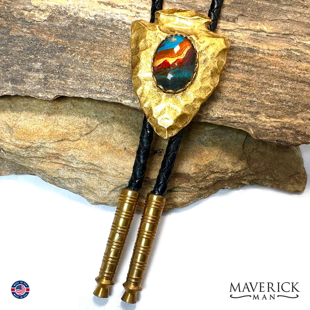 Golden arrowhead bolo tie with southwestern hand painted stone
