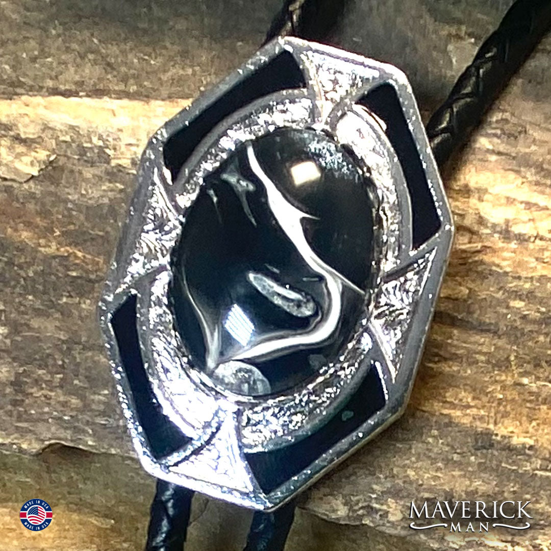 Silver bolo tie with black and white hand painted stone