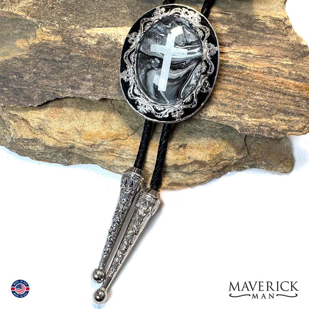 Christian bolo tie with hand painted stone and embedded cross