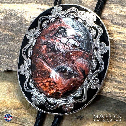 Filigree bolo tie with copper w black and white hand painted stone