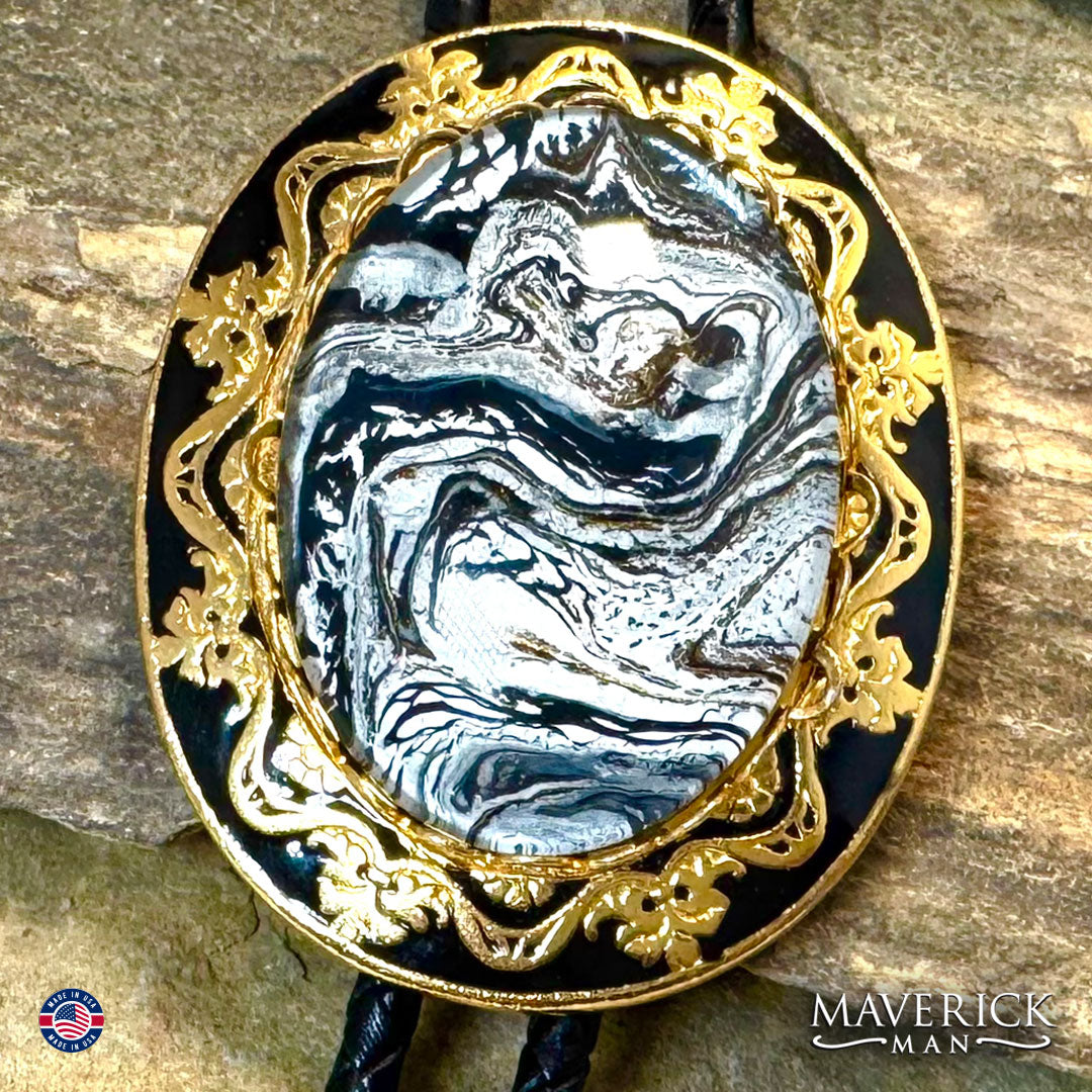 Dressy gold bolo tie with black white and gold stone