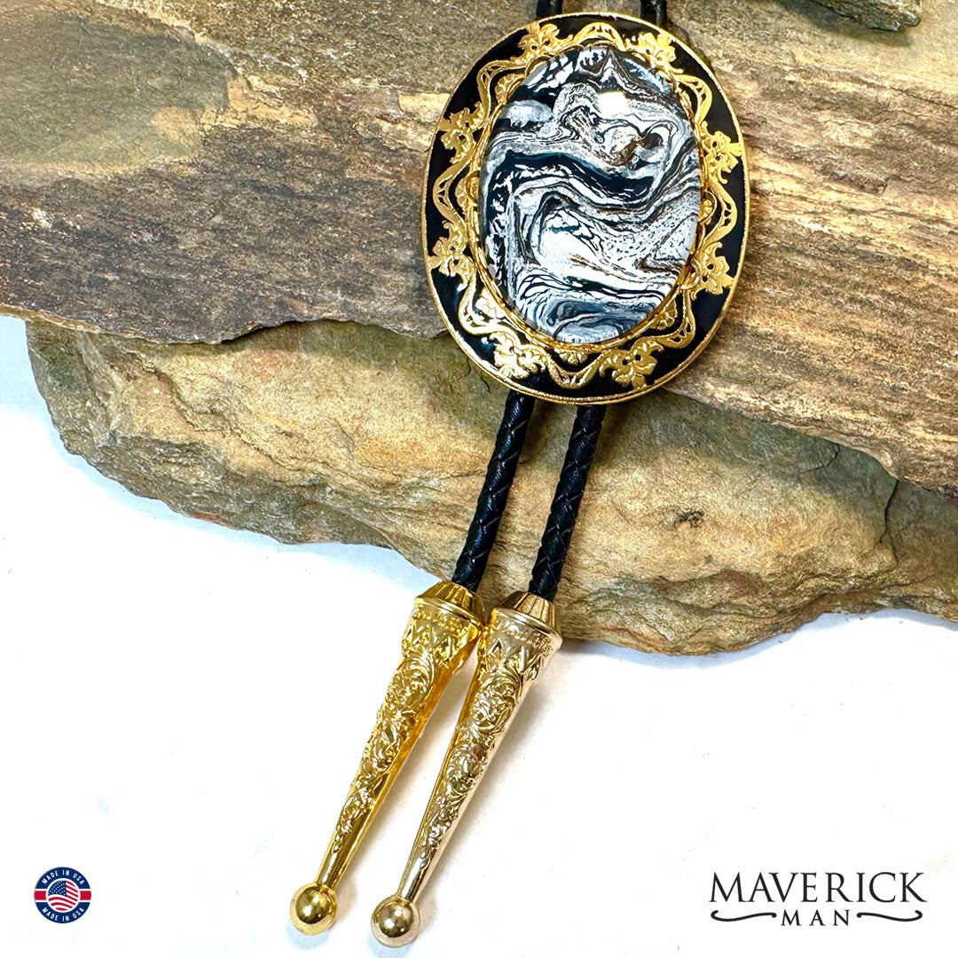 Dressy gold bolo tie with black white and gold stone