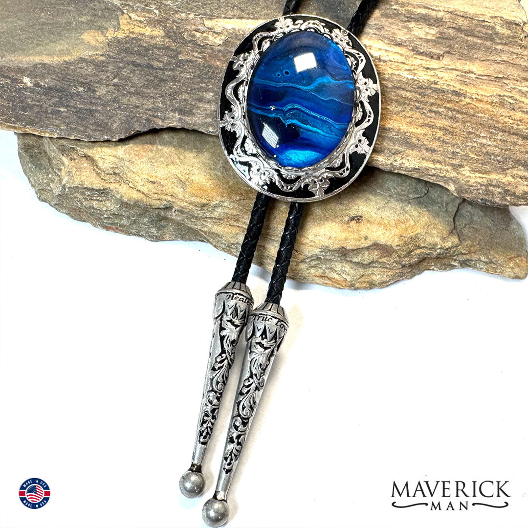Handsome hand painted blue stone in filigree bolo tie
