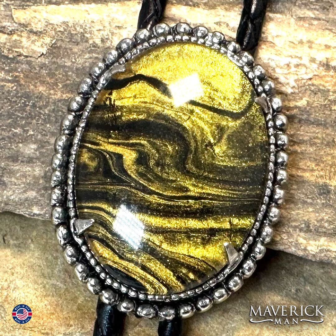 Beaded bolo tie with gold and black hand painted stone