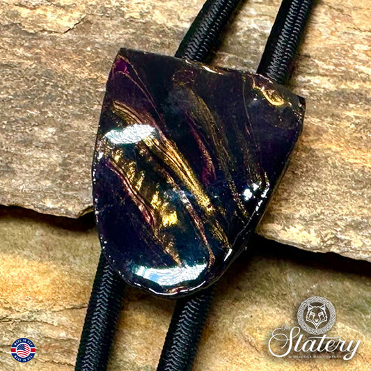 Small purple and gold bolo tie made from slate