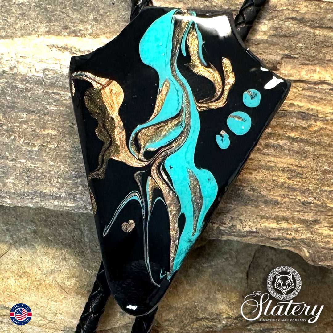 Arrowhead bolo tie handprinted with blackjack turquoise colors