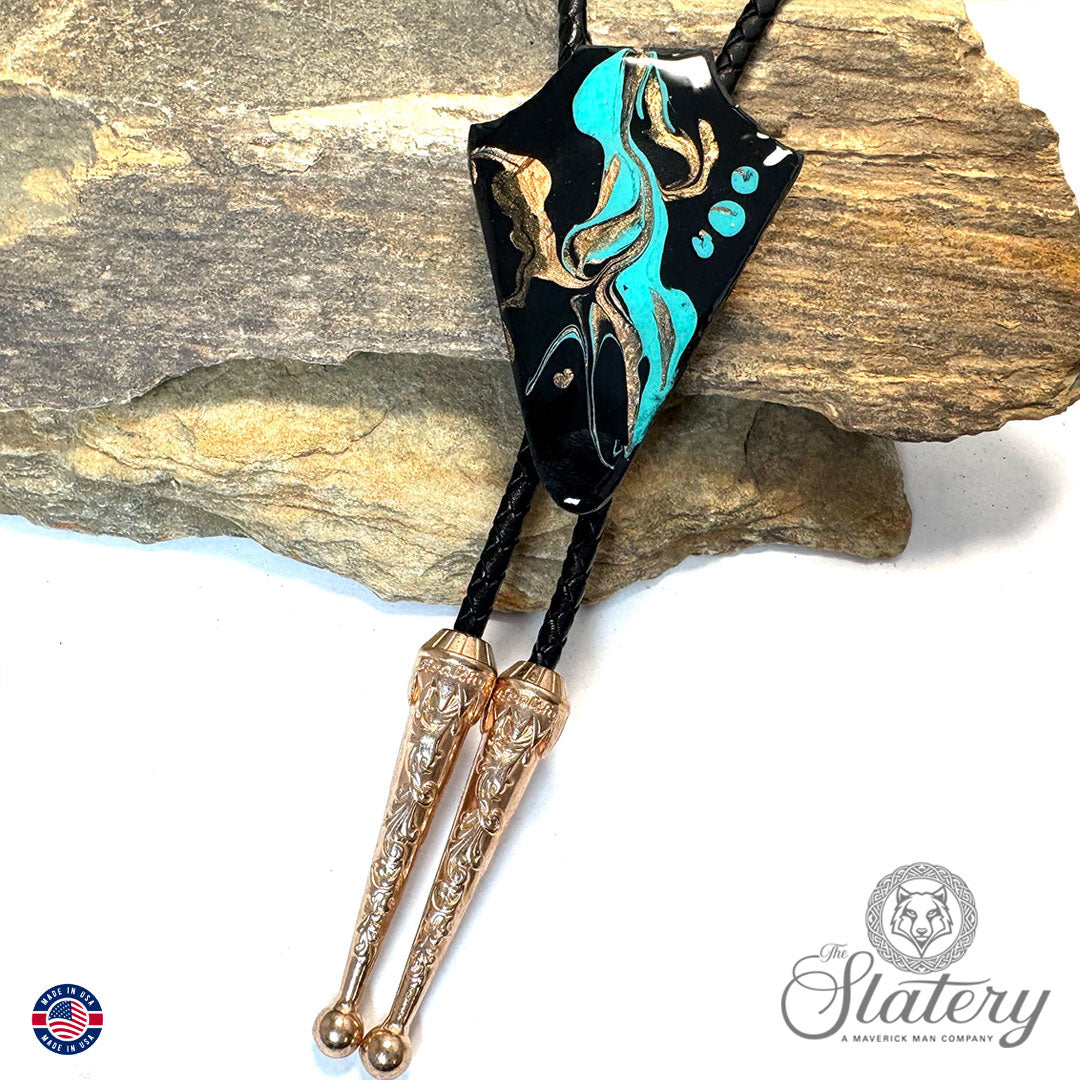 Arrowhead bolo tie handprinted with blackjack turquoise colors