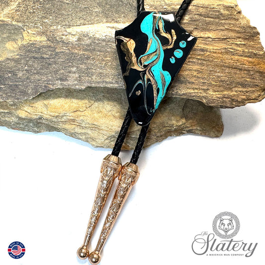 Arrowhead bolo tie handprinted with blackjack turquoise colors
