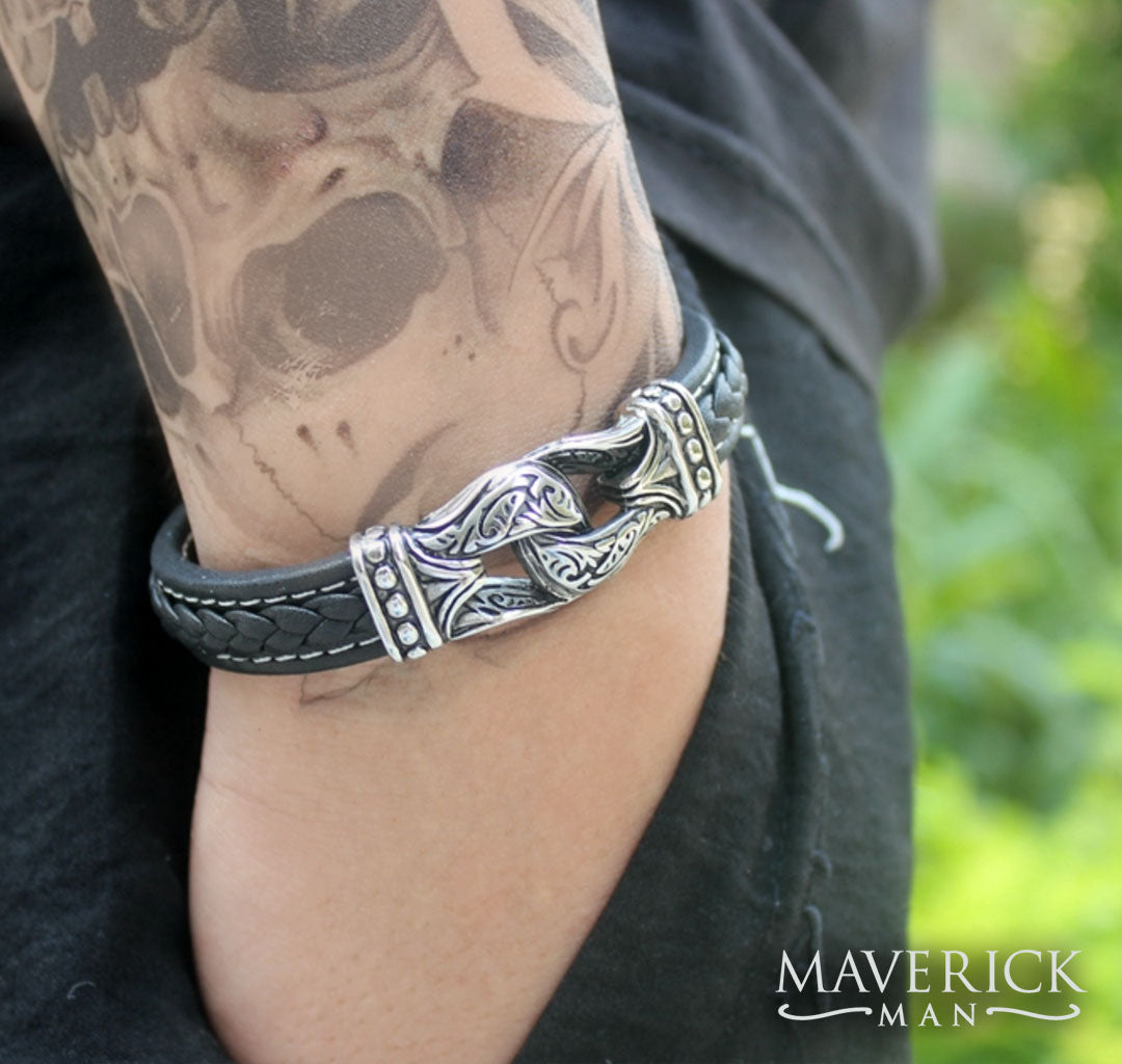 Braided leather bracelet with stainless steel filigree accents
