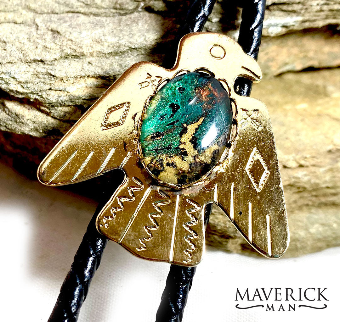 Golden thunderbird bolo with hand painted green and gold stone