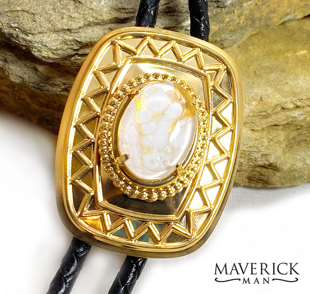 Modern unisex bolo with hand white and gold stone